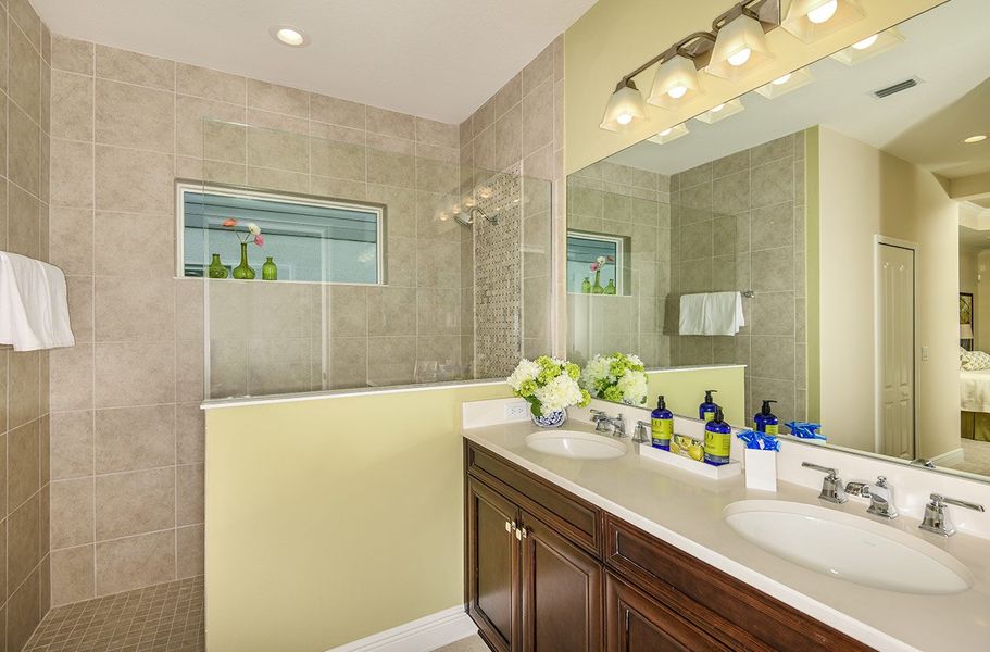 Representative furnished interior of a home built from the Applause by Neal Communities in Verandah, Fort Myers (Image 17).