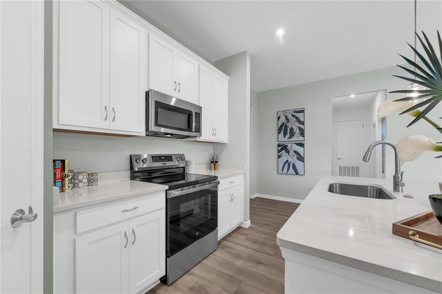Furnished interior view inside a new home in Green Leaf, West Melbourne (Image 38).