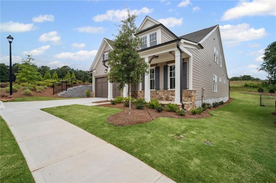Front exterior of a new home in Lakeside at River Green, Canton, GA, highlighting curb appeal (Image 19).