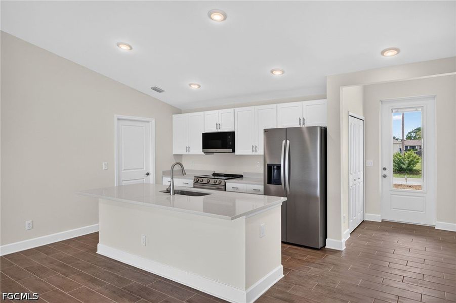 Furnished interior view inside a new home in Cape Coral, Cape Coral (Image 11). Furnished interior view inside a new home in Cape Coral, Cape Coral (Image 11).