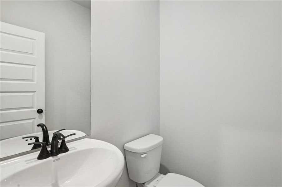 Furnished interior view inside a new home in Martin Springs - Estate Series, Lawrenceville (Image 10).