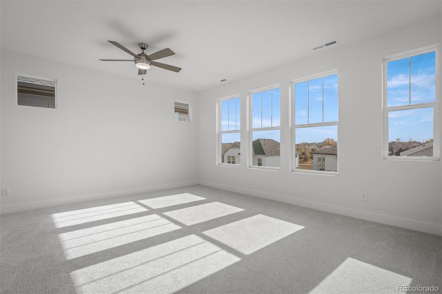 Spacious, unfurnished interior of a new home in Trailside at Cottonwood Creek, Colorado Springs (Image 24).