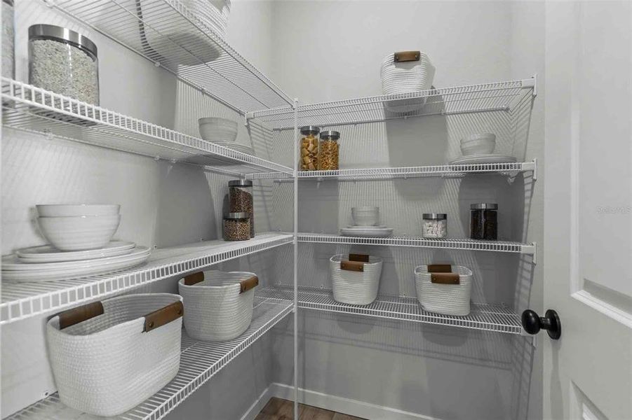 Furnished interior view inside a new home in The Cypress Series at Reserve East, Flagler Beach (Image 17).