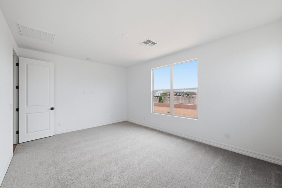 Spacious, unfurnished interior of a new home in Artisan at Asante, Surprise (Image 22).