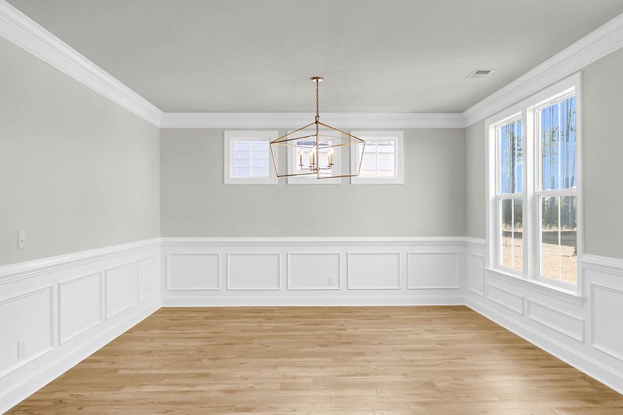 Spacious, unfurnished interior of a new home in Tidewater at Lakes of Cane Bay, Summerville (Image 44).