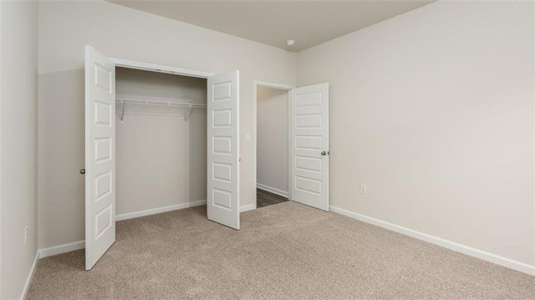Spacious, unfurnished interior of a new home in Brooks Station, Dacula (Image 28).