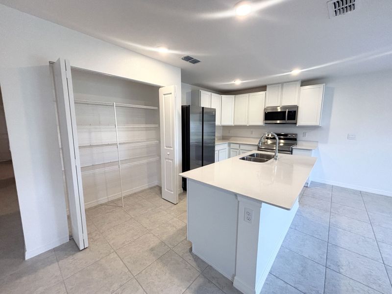 Furnished interior view inside a new home in Poinciana, Poinciana (Image 4).