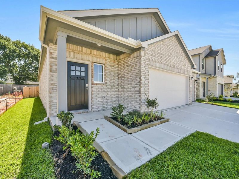Exterior details and patio area of a home in Windmill Estates, Magnolia (Image 3). Exterior details and patio area of a home in Windmill Estates, Magnolia (Image 3).
