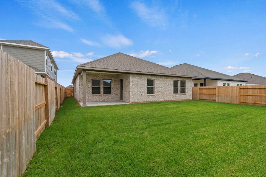 Exterior details and patio area of a home in Windrose Green, Angleton (Image 4). Exterior details and patio area of a home in Windrose Green, Angleton (Image 4).