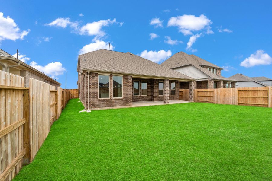 This backyard is perfect for family gatherings, social events, or simply unwinding in the fresh air.