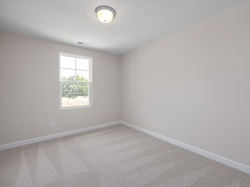 Spacious, unfurnished interior of a new home in Springvale, Willow Spring (Image 18).