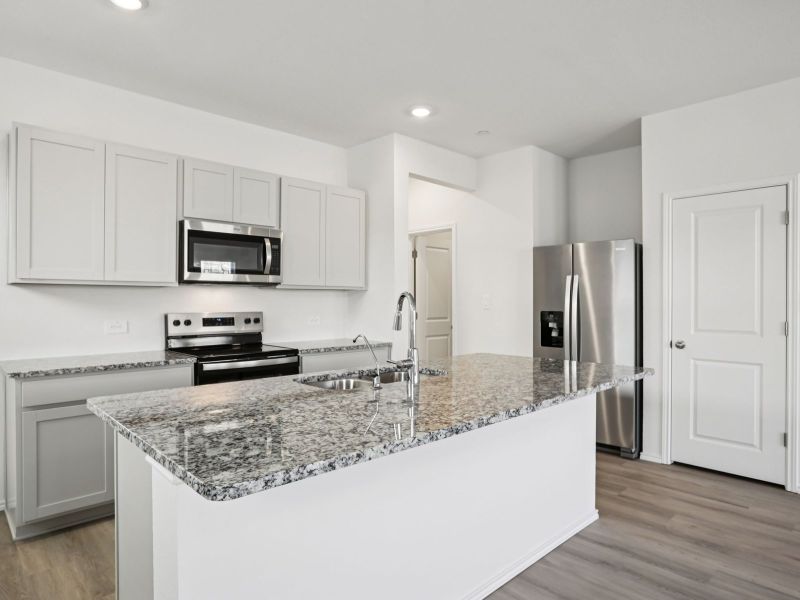 Furnished interior view inside a new home in Turner's Village, Buda (Image 3).
