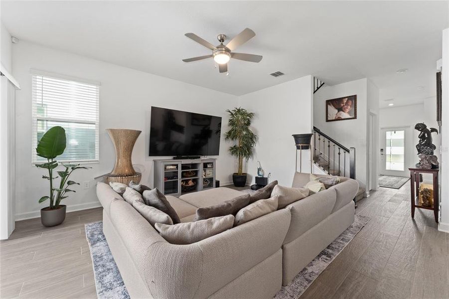 Furnished interior view inside a new home in Storey Park: Innovation Manor Collection, Orlando (Image 9).