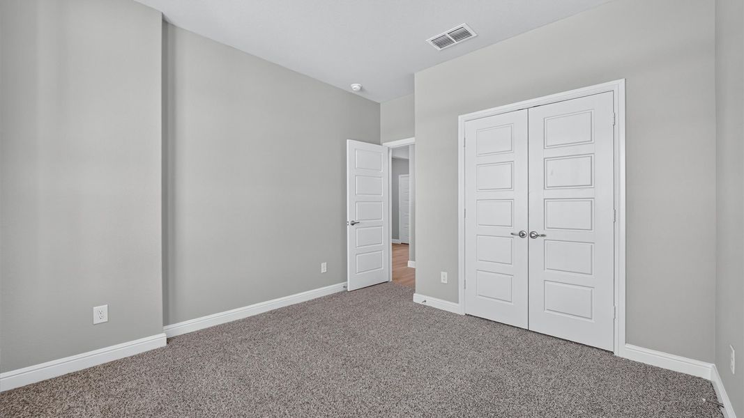 Representative unfurnished interior of a home built from the Tallow by D.R. Horton in Treeline, Justin (Image 35).