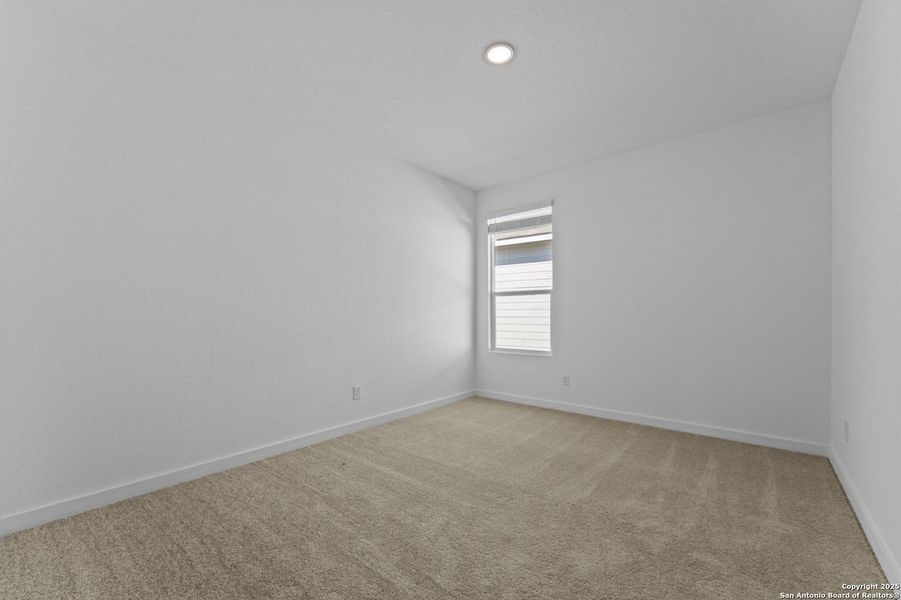 Spacious, unfurnished interior of a new home in Waterwheel: Coastline Collection, San Antonio (Image 9).