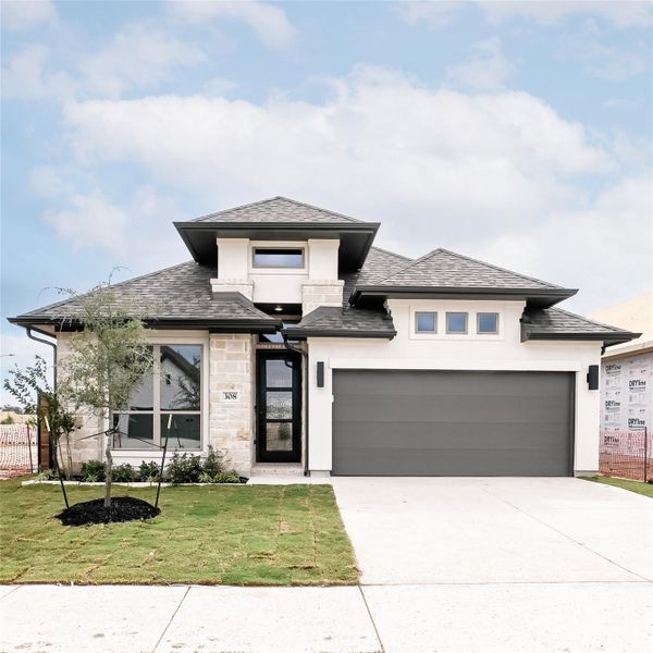 Front exterior of a new home in Juniper Springs, Lockhart, TX, highlighting curb appeal (Image 2).