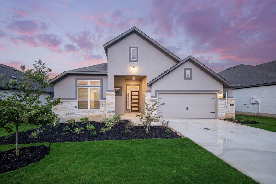 Representative exterior photo of a completed home built from the Mackenzie by Chesmar Homes in Harvest Hills, Marion, TX (Image 16).