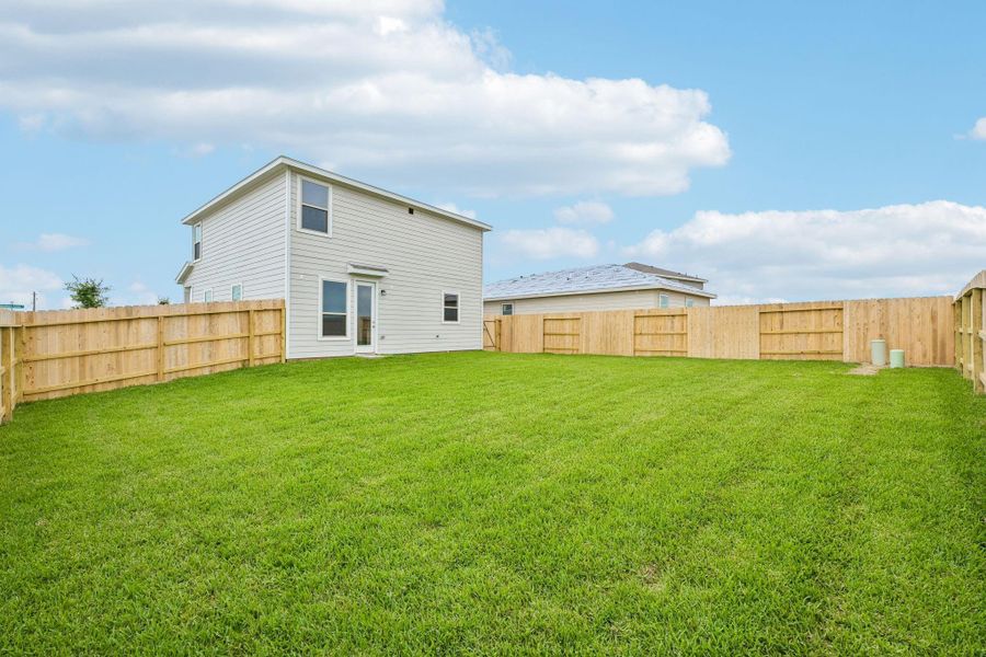 Expansive corner lot with massive backyard green space—a true blank slate ready for your dream pool, outdoor kitchen, or personal garden oasis.