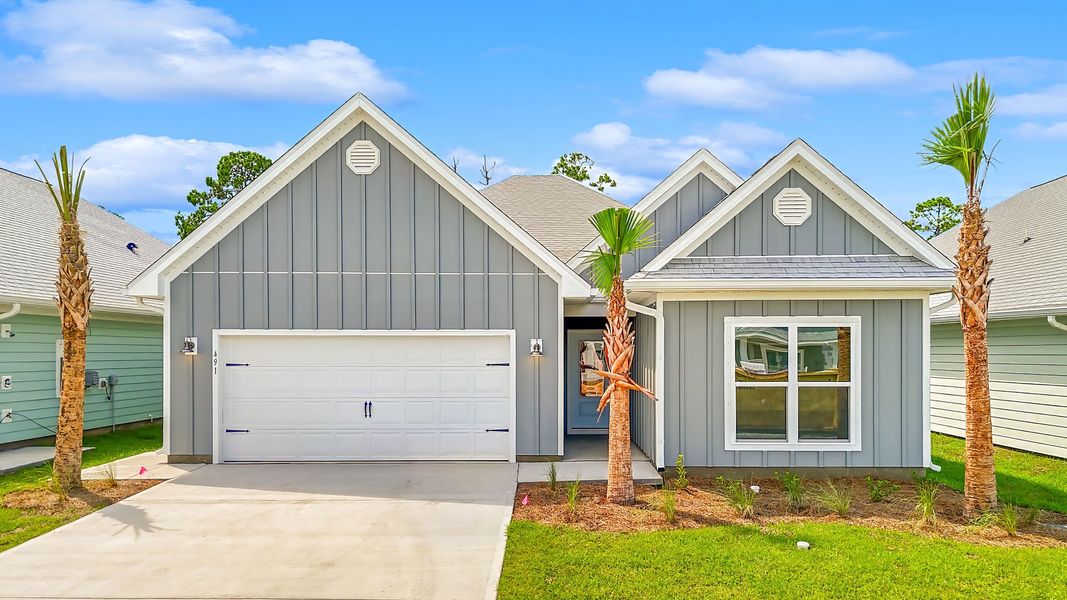 Representative exterior photo of a completed home built from the The Kennedy by D.R. Horton in WindMark Beach, Port Saint Joe, FL (Image 1). Representative exterior photo of a completed home built from the The Kennedy by D.R. Horton in WindMark Beach, Port Saint Joe, FL (Image 1).