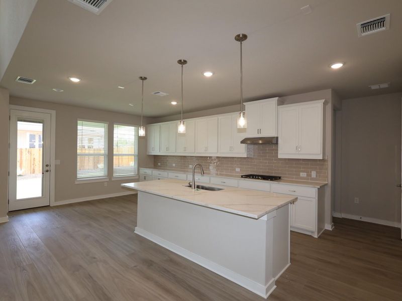 Furnished interior view inside a new home in Edgewood, Leander (Image 6). Furnished interior view inside a new home in Edgewood, Leander (Image 6).