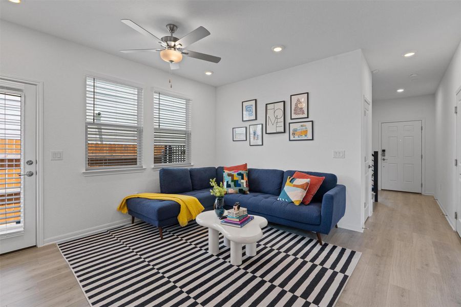 Living room featuring  recessed lighting and ceiling fan