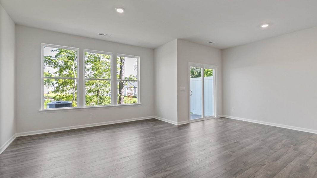 Representative unfurnished interior of a home built from the LANSING - TRADITIONS by D.R. Horton in Chapel Townes, Raleigh (Image 14).