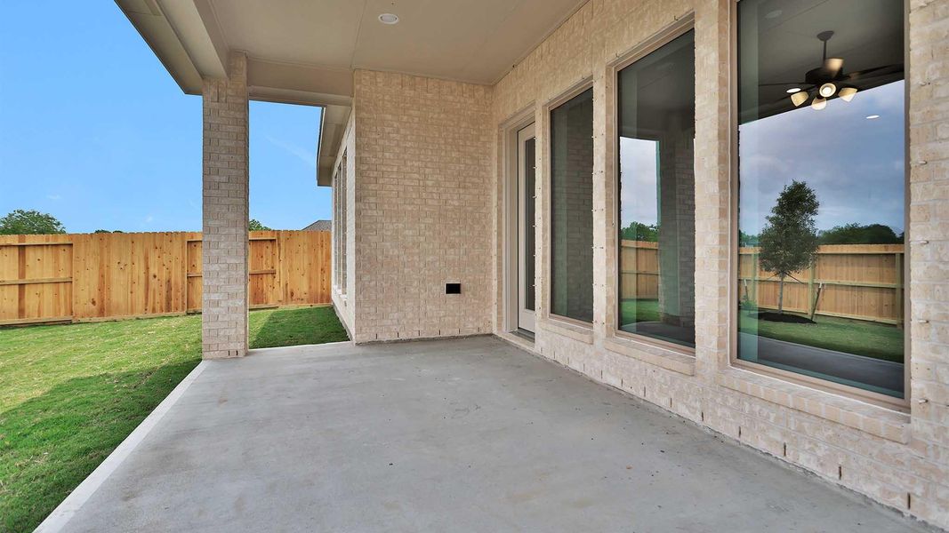 Exterior details and patio area of a home in Valencia, Manvel (Image 4). Exterior details and patio area of a home in Valencia, Manvel (Image 4).