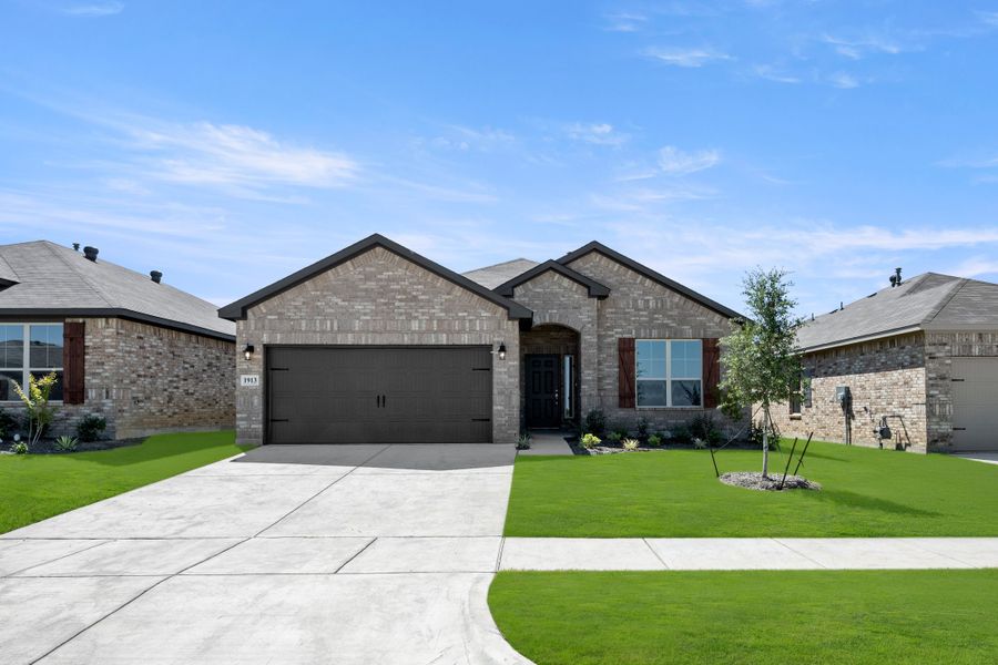 Front exterior of a new home in Baker Farms, Cleburne, TX, highlighting curb appeal (Image 2). Front exterior of a new home in Baker Farms, Cleburne, TX, highlighting curb appeal (Image 2).