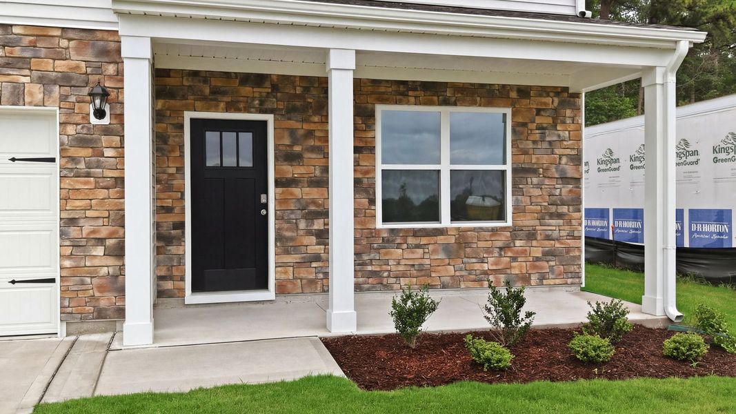 Exterior details and patio area of a home in Ridgewood Farms, Winterville (Image 26). Exterior details and patio area of a home in Ridgewood Farms, Winterville (Image 26).