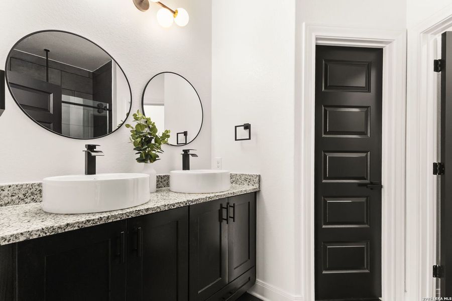 Furnished interior view inside a new home in , Elmendorf (Image 24).