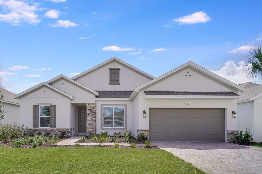 Representative exterior photo of a completed home built from the Ambra by Taylor Morrison in Esplanade at Westview, Kissimmee, FL (Image 1). Representative exterior photo of a completed home built from the Ambra by Taylor Morrison in Esplanade at Westview, Kissimmee, FL (Image 1).
