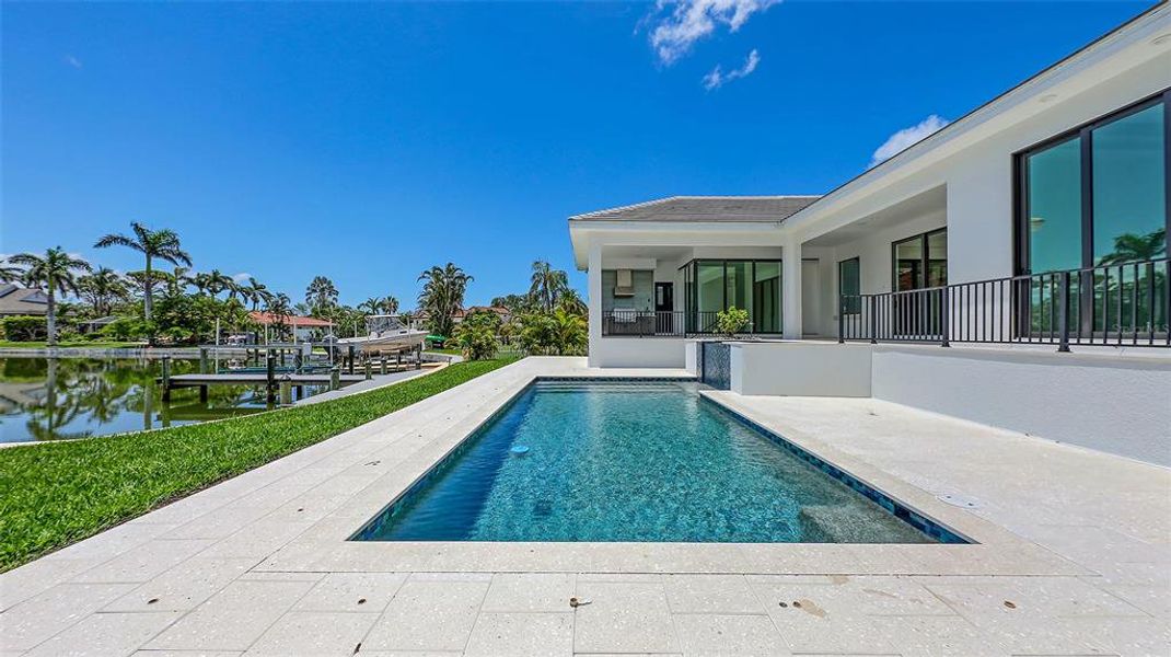 Exterior details and patio area of a home in , Longboat Key (Image 32).