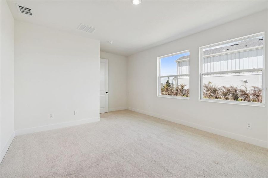 Spacious, unfurnished interior of a new home in Coasterra, Palmetto (Image 38).