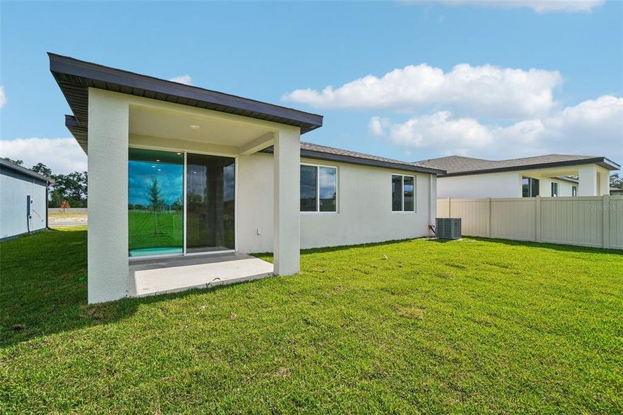Exterior details and patio area of a home in Pine Ridge Meadows, Hudson (Image 3).