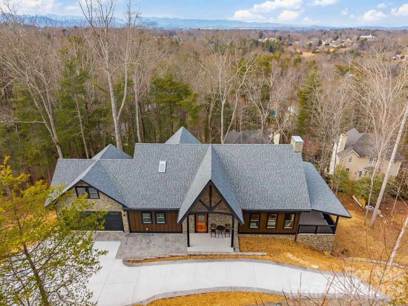Front exterior of a new home in , Asheville, NC, highlighting curb appeal (Image 27).