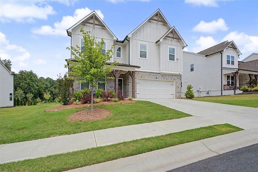 Front exterior of a new home in Pine Mountain Park, Kennesaw, GA, highlighting curb appeal (Image 2). Front exterior of a new home in Pine Mountain Park, Kennesaw, GA, highlighting curb appeal (Image 2).