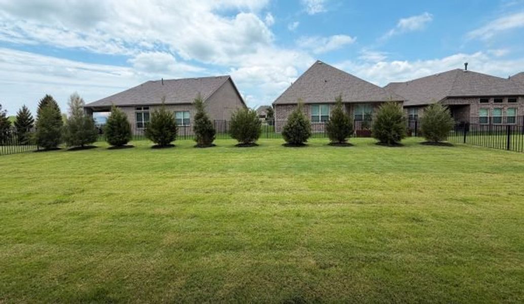 Front exterior of a new home in Heath Golf and Yacht Club, Forney, TX, highlighting curb appeal (Image 30).
