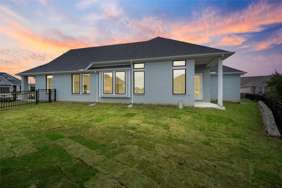 Come explore this generous backyard—perfect for kids to play freely and adults to unwind in comfort!