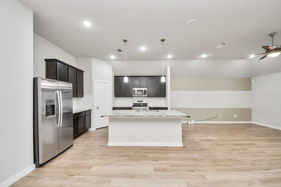 Furnished interior view inside a new home in Marvida, Cypress (Image 6).