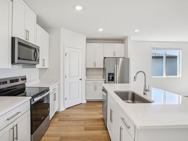 Furnished interior view inside a new home in Oakfield Trails - Classic Series, Parrish (Image 3).
