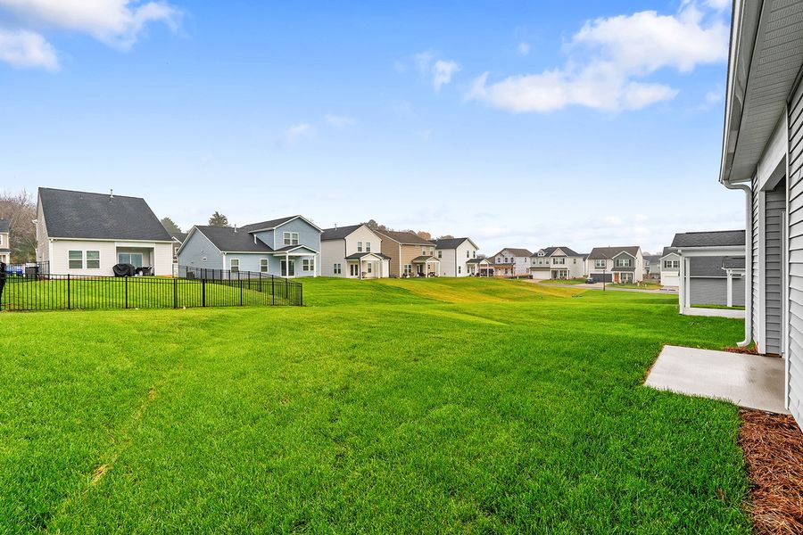 Exterior details and patio area of a home in Hanes Lake, Winston-Salem (Image 4).