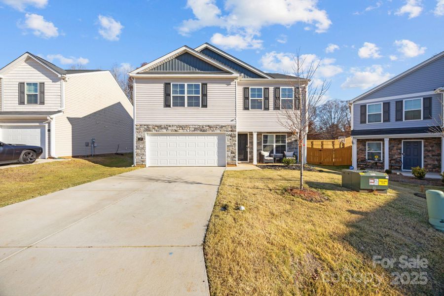 Front exterior of a new home in , Mocksville, NC, highlighting curb appeal (Image 29).
