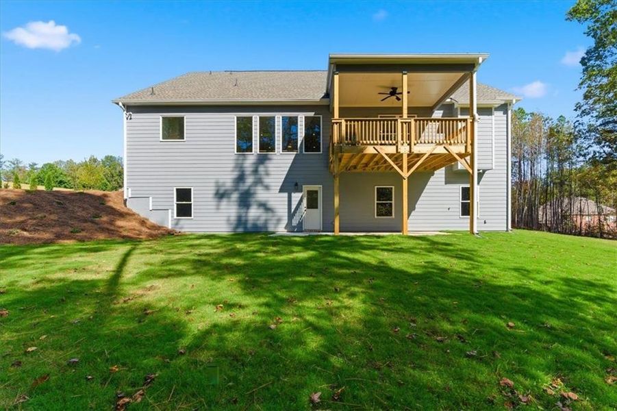 Exterior details and patio area of a home in The Estates at Hurricane Pointe, Douglasville (Image 25). Exterior details and patio area of a home in The Estates at Hurricane Pointe, Douglasville (Image 25).