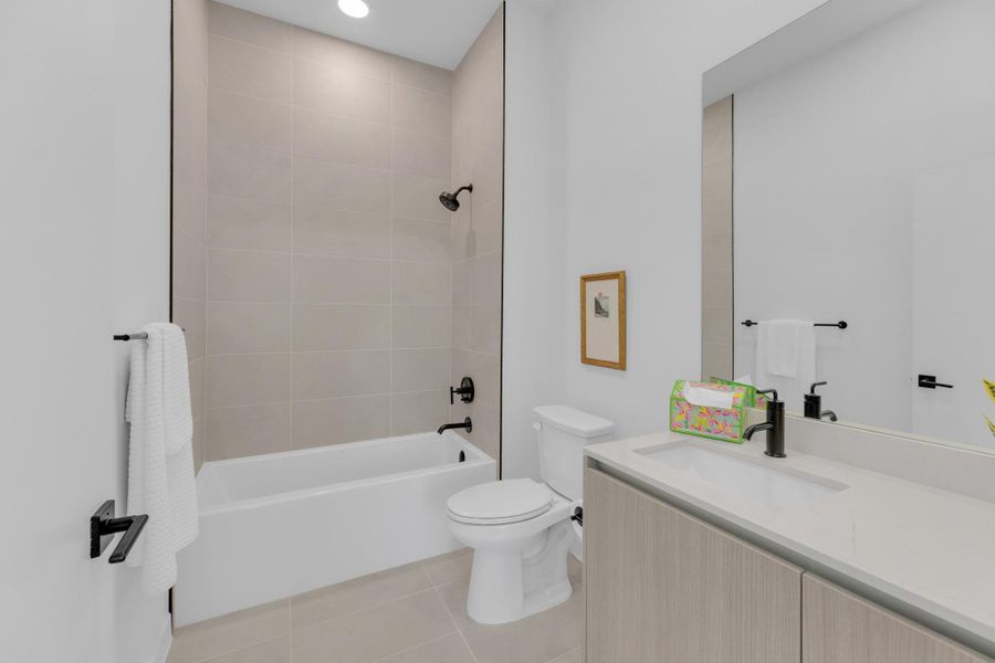 Furnished interior view inside a new home in One Oak, Austin (Image 17).