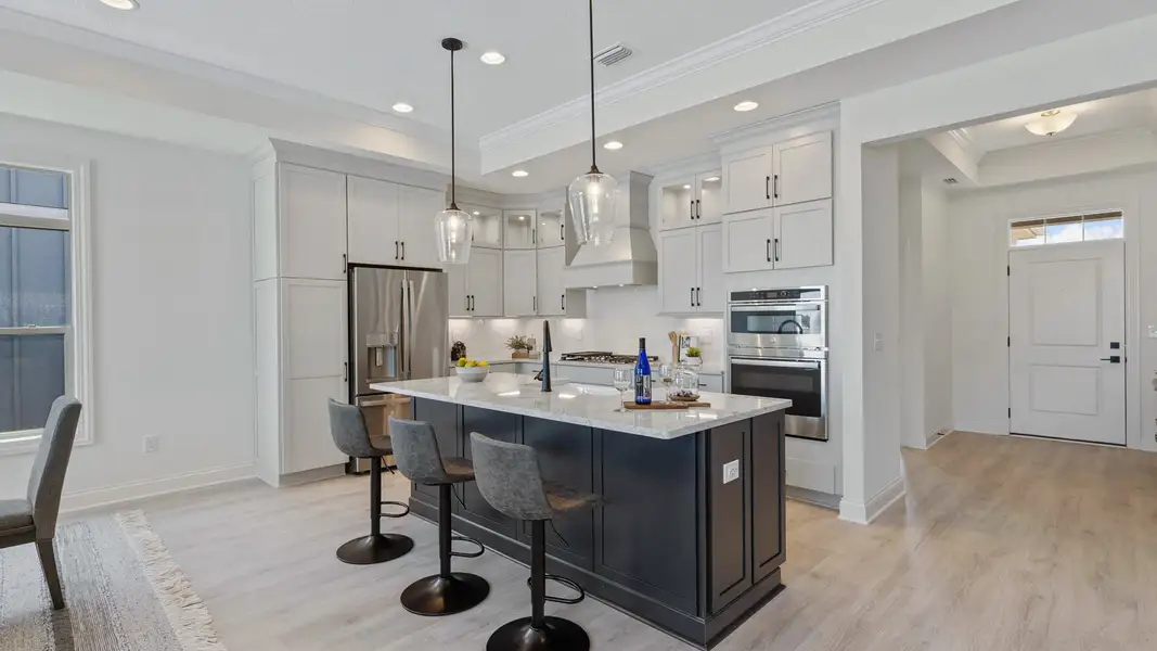 Representative furnished interior of a home built from the Salerno by Epcon Communities in Courtyards by Carrell, Ocean Isle Beach (Image 5).
