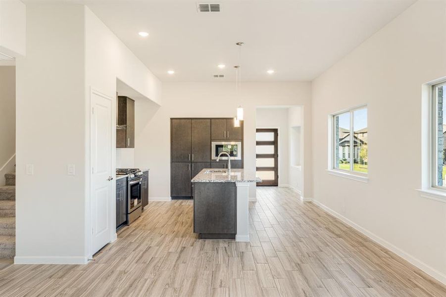 Furnished interior view inside a new home in Bear Creek Elements, Lavon (Image 9). Furnished interior view inside a new home in Bear Creek Elements, Lavon (Image 9).