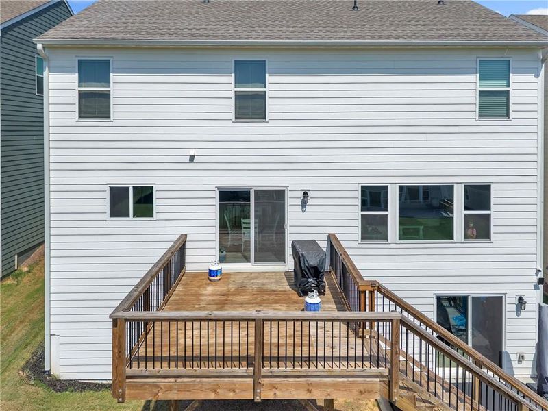 Exterior details and patio area of a home in Twin Lakes, Hoschton (Image 3).