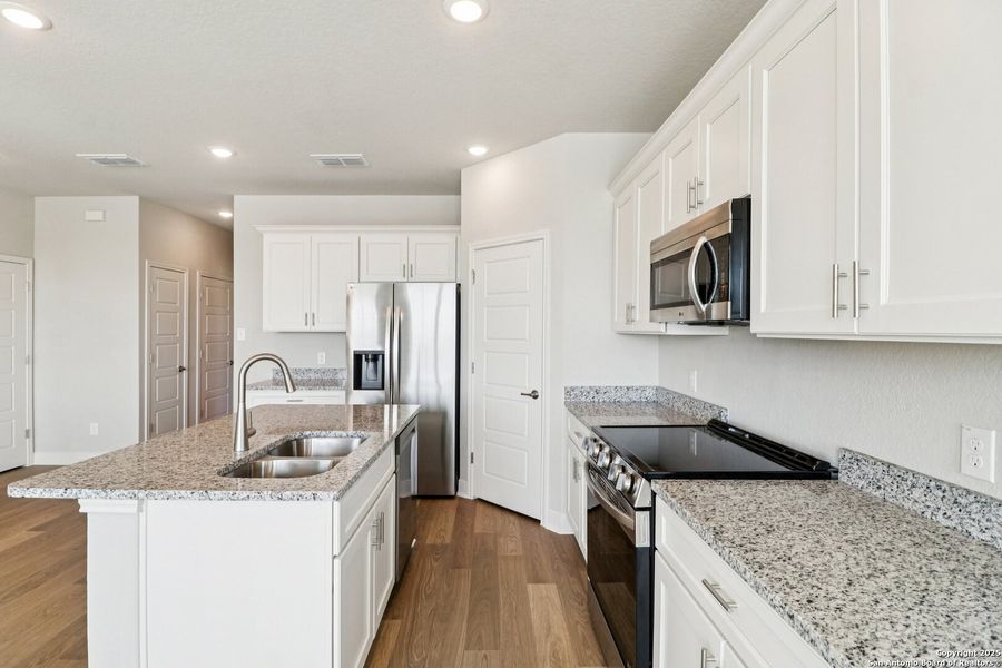 Furnished interior view inside a new home in Magnolia Village, San Antonio (Image 15). Furnished interior view inside a new home in Magnolia Village, San Antonio (Image 15).