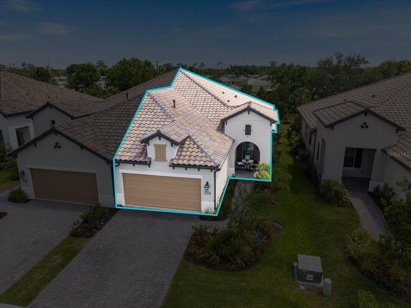 Front exterior of a new home in , Englewood, FL, highlighting curb appeal (Image 20). Front exterior of a new home in , Englewood, FL, highlighting curb appeal (Image 20).