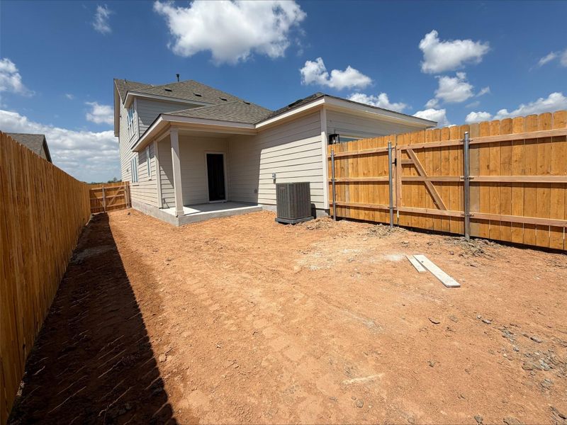 Exterior details and patio area of a home in Creeks Crossing, Elgin (Image 13).